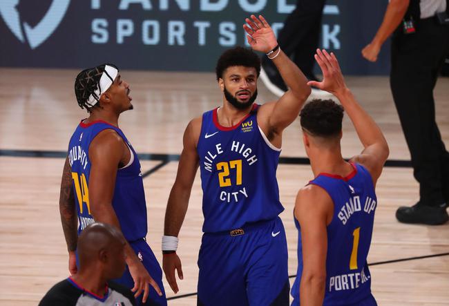 被球迷询问是否会考虑加盟阿森纳，库尼亚大笑回应（被问是否加盟阿森纳，库尼亚笑着回应）